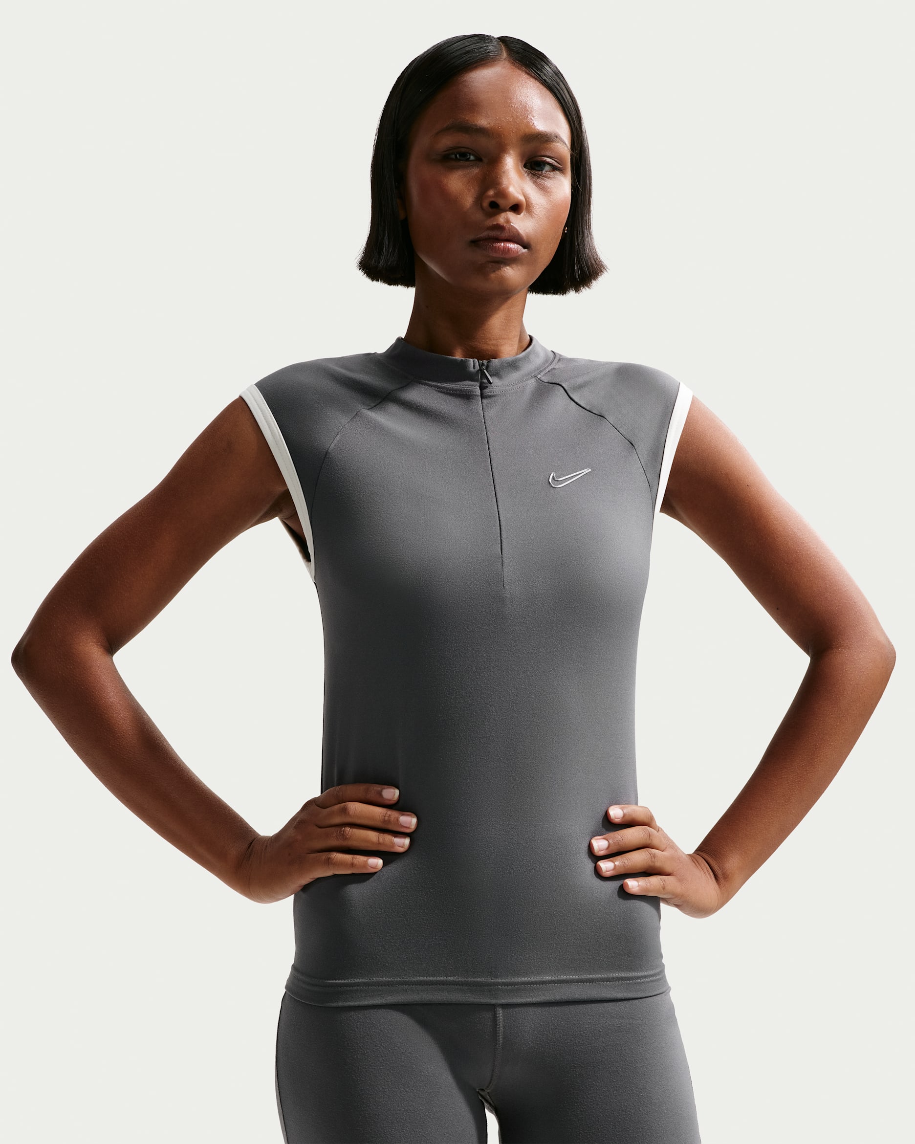 Nike Sportswear Women's Tight Sleeveless 1/4-Zip Top. Nike.com